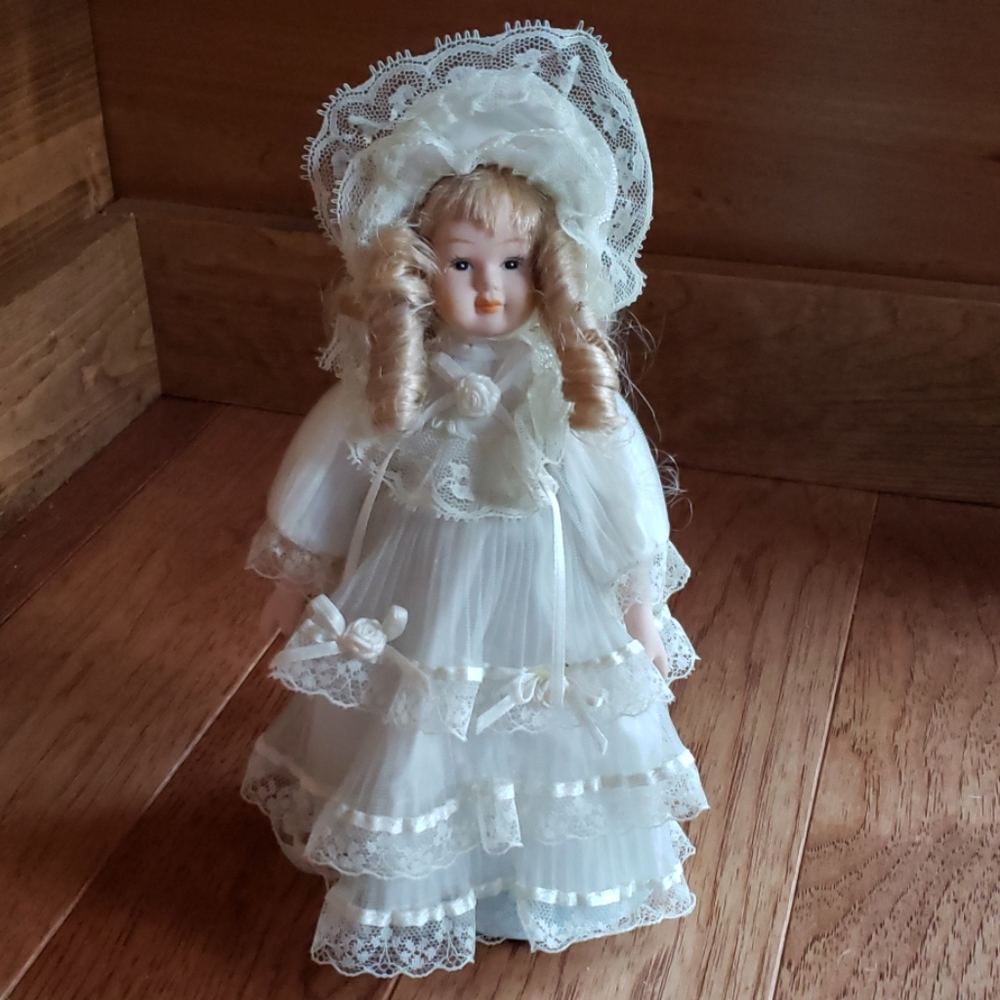 Porcelain Doll With Stand